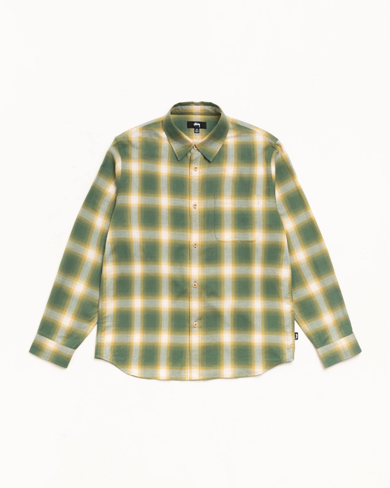 Green ombré plaid long-sleeve button-up shirt with chest pocket, flat lay.