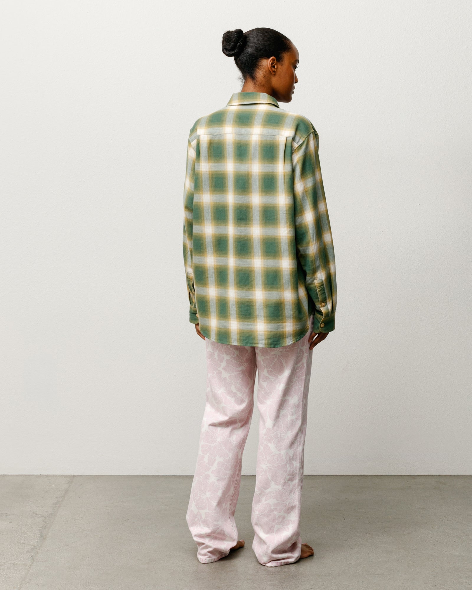 Unisex green ombre plaid long-sleeve shirt, back view with buttoned cuffs