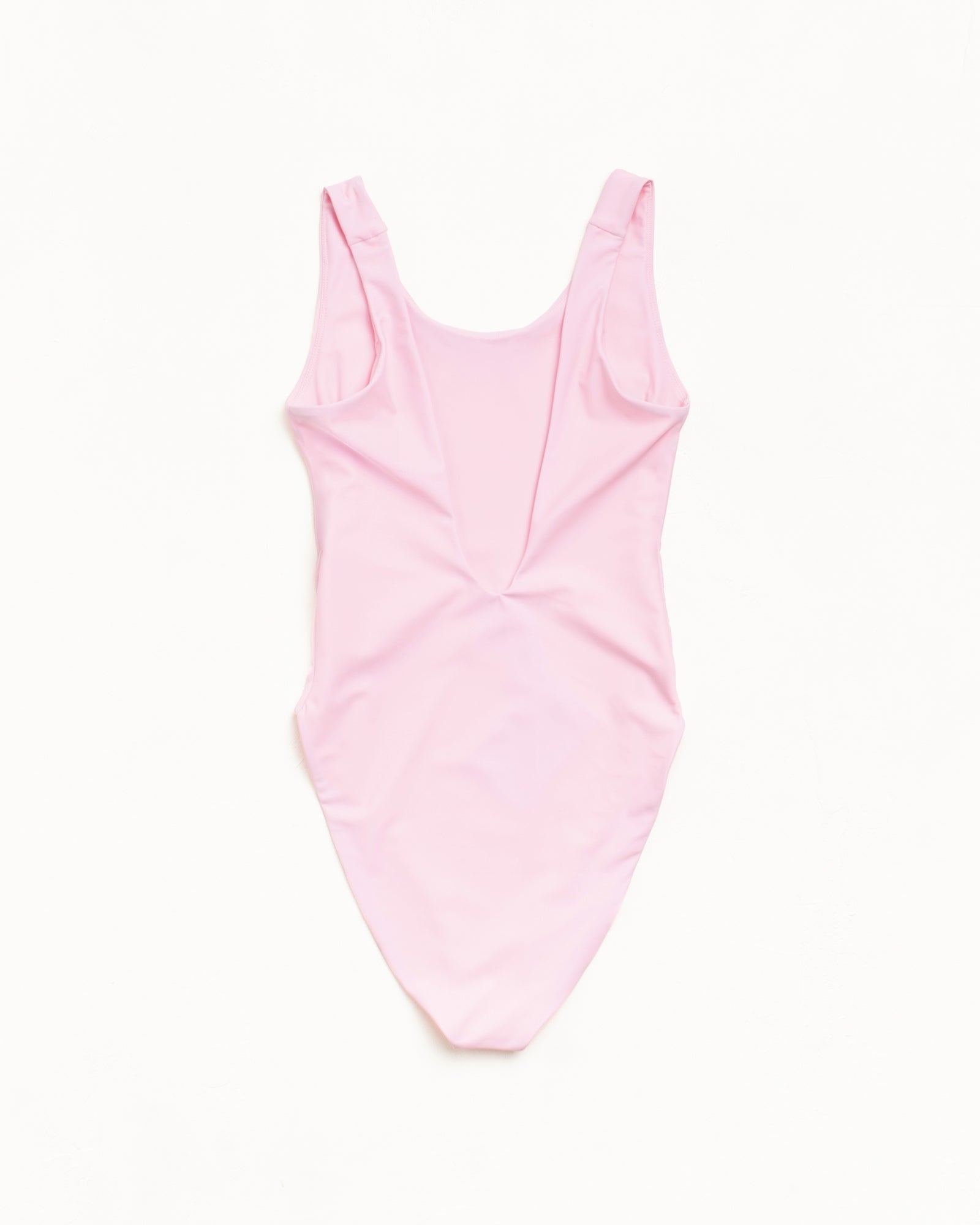 Surf Stock One Piece Swimsuit in the colour Pink, featuring a scooped back and high-cut leg.