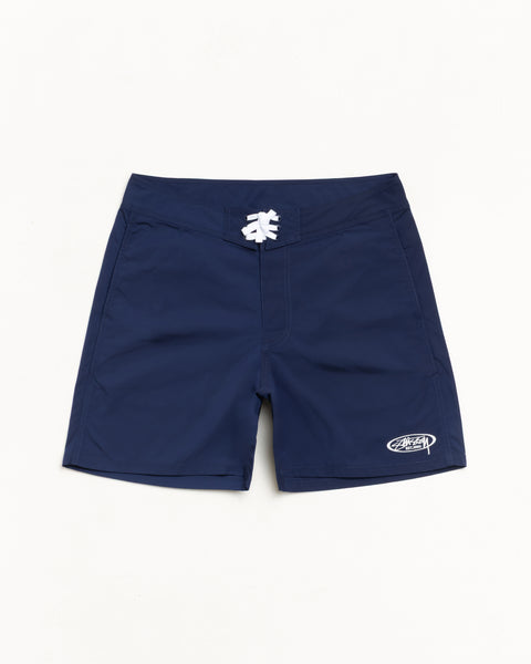 Blue board shorts with white lace-up drawcord and small logo at hem, unisex regular fit