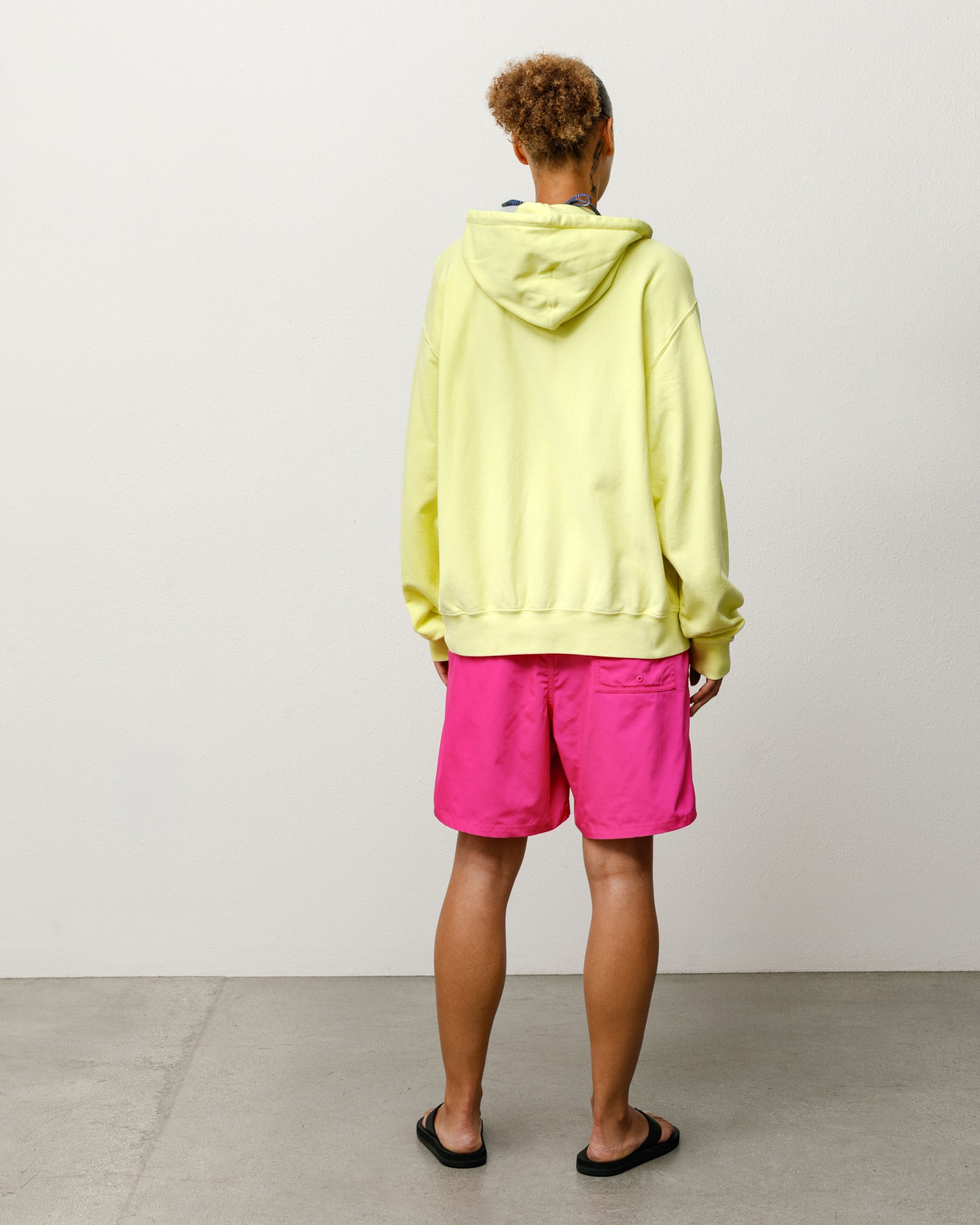 Pink Coastal Board Short on model, back view with rear patch pocket detail