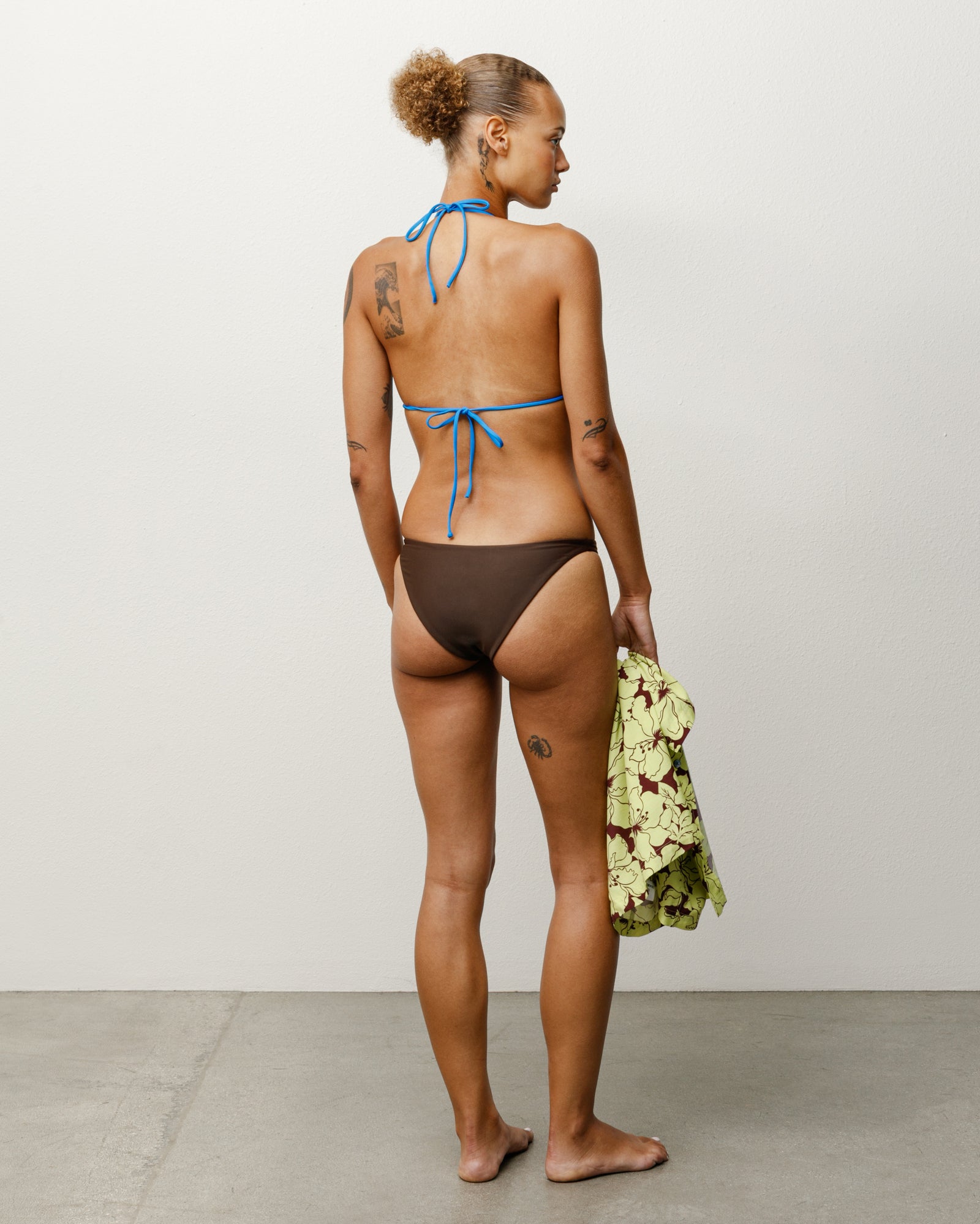 Bikini Bottom Womens in the color Brown with a rubberized Stüssy logo.