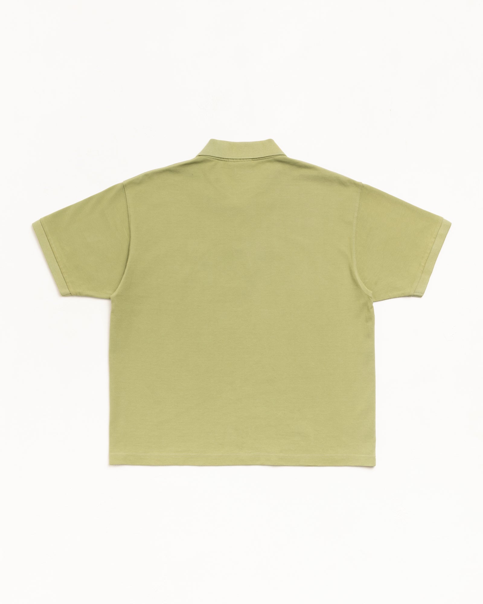 Leaf green pique cotton polo, short-sleeve, flat-lay back view
