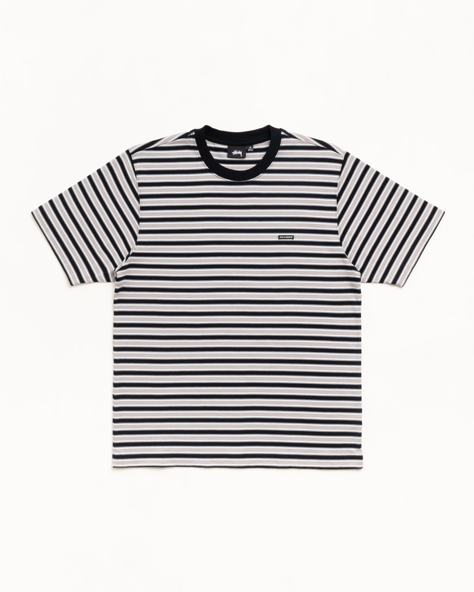 Black striped short-sleeve tee with horizontal bands and a ribbed crewneck, laid flat on white.