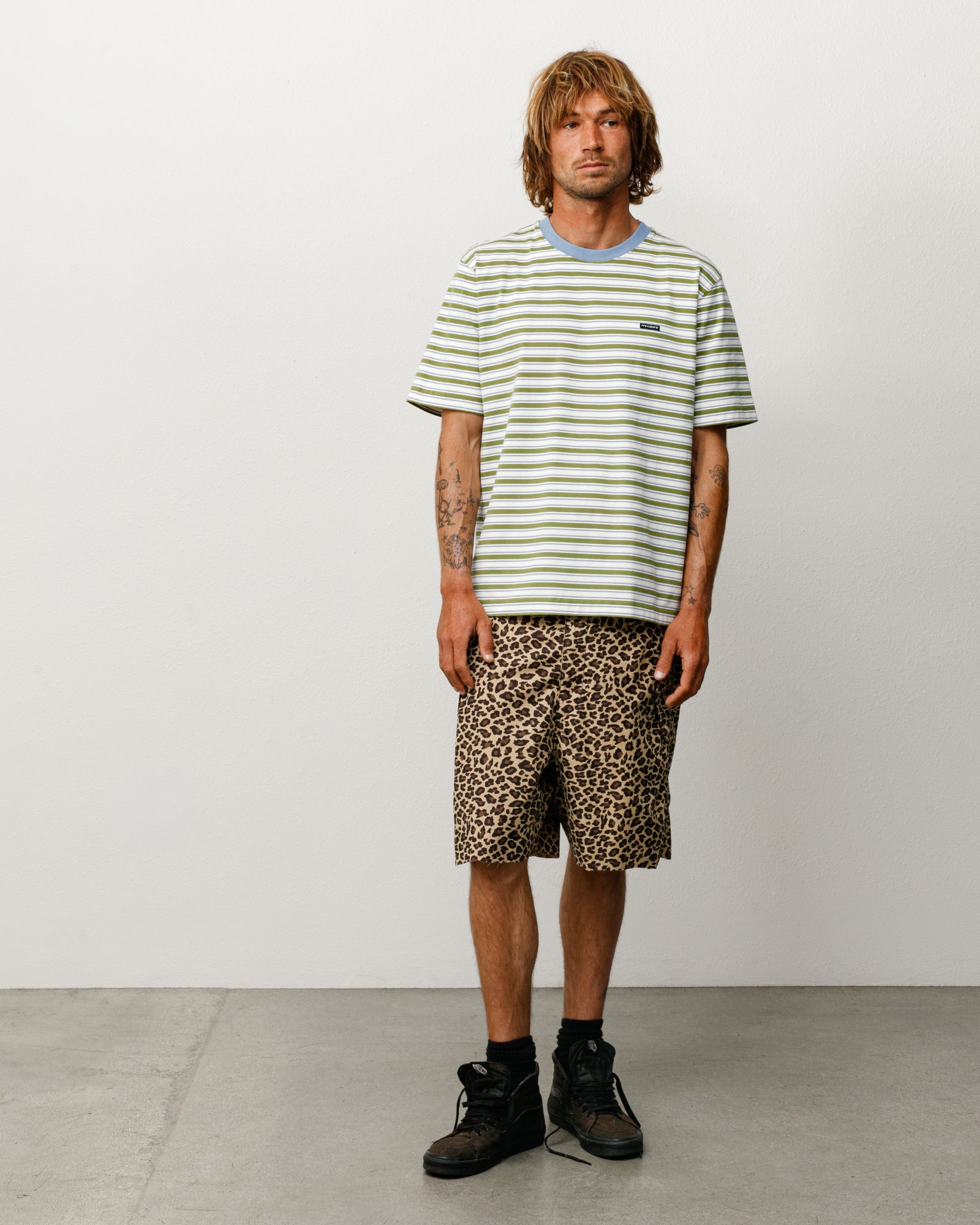 Beach Stripe Tee in Moss with blue ribbed collar, modelled front view