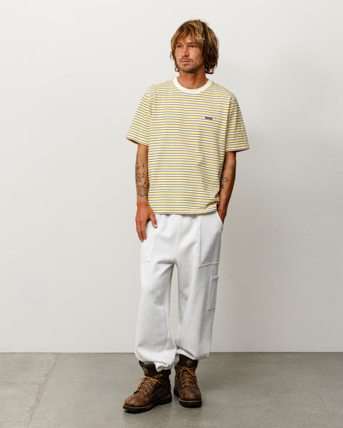 Unisex beach stripe short-sleeve tee in yellow, shown on model front view