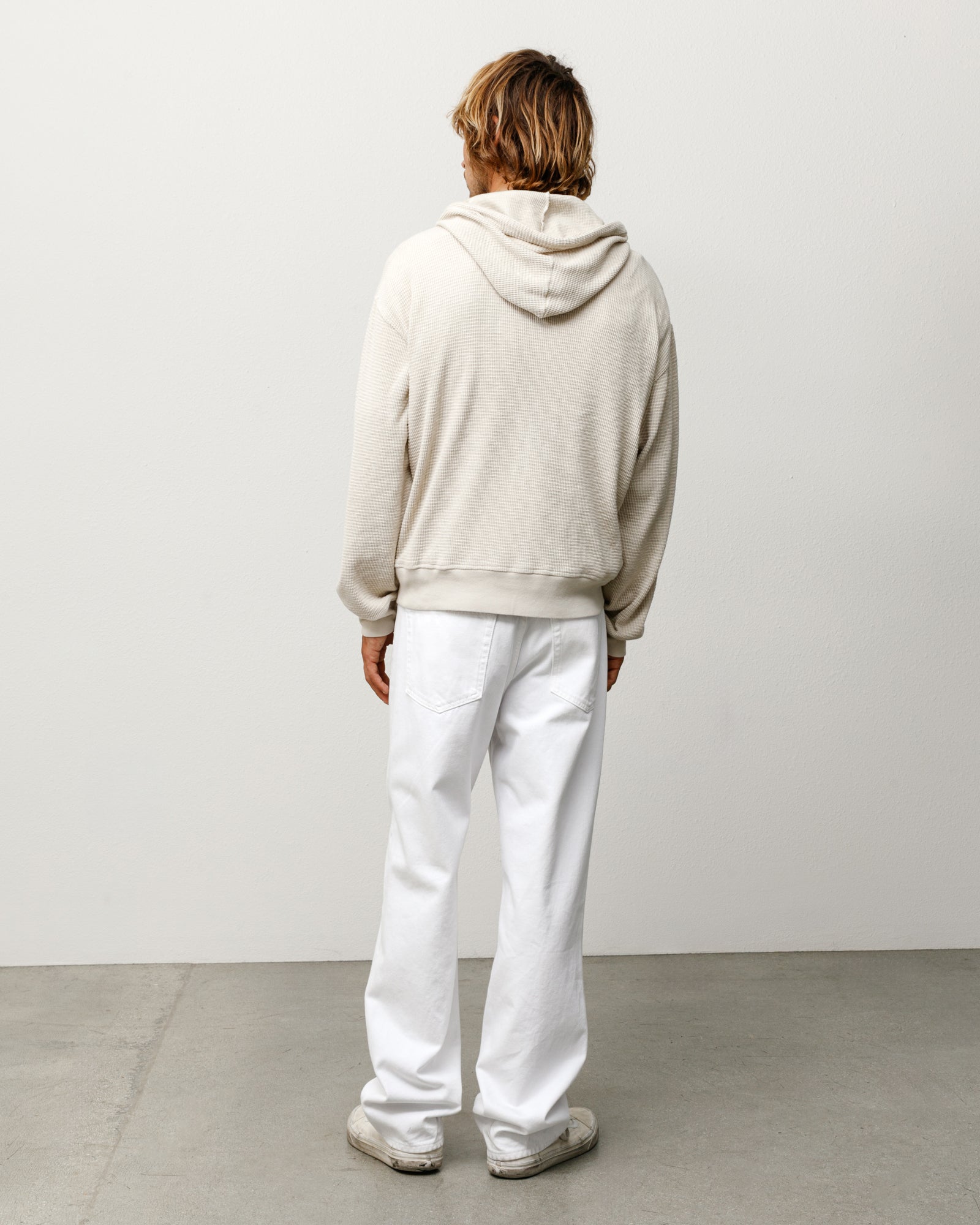 Bone lightweight thermal hoodie, unisex long-sleeve back view with waffle knit and ribbed hem.