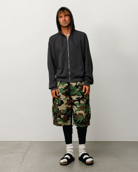Lightweight thermal zip hoodie in faded black on model, relaxed fit waffle knit