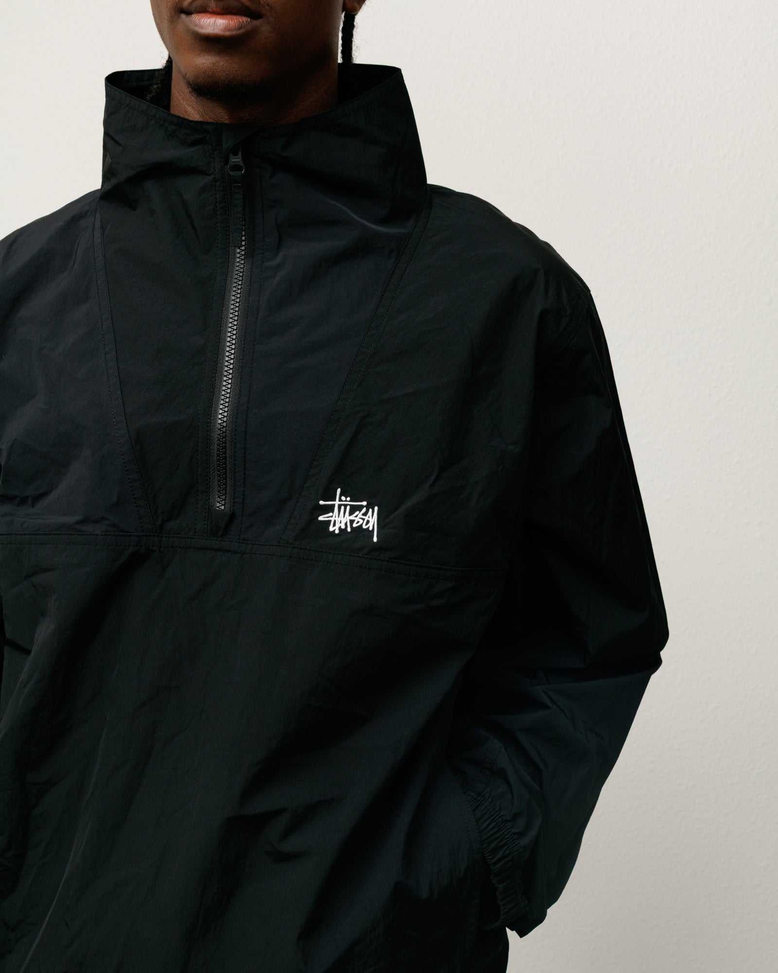 Warm Up Pullover – Black | Outerwear | Stüssy Canada
