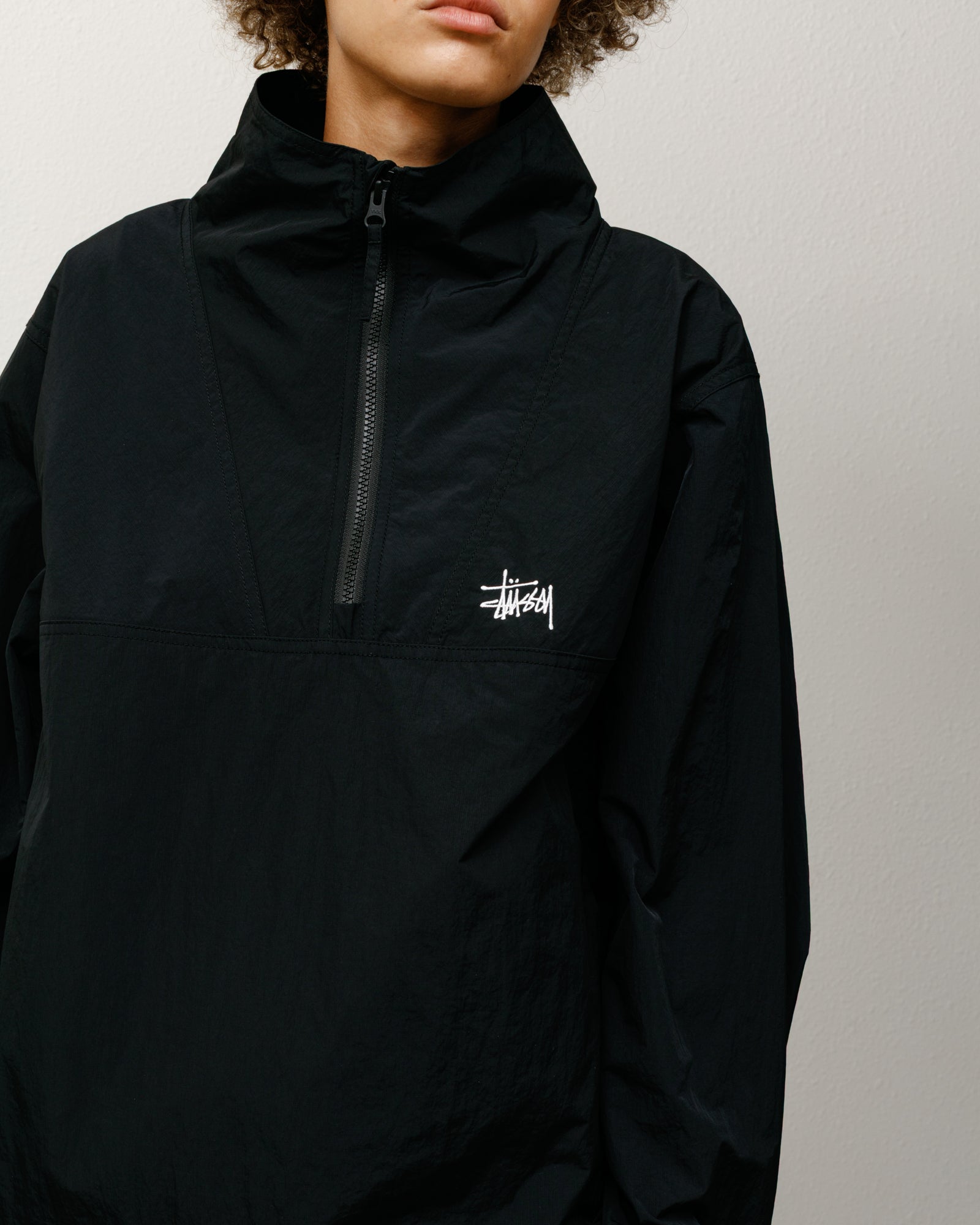 Warm Up Pullover – Black | Outerwear | Stüssy Canada