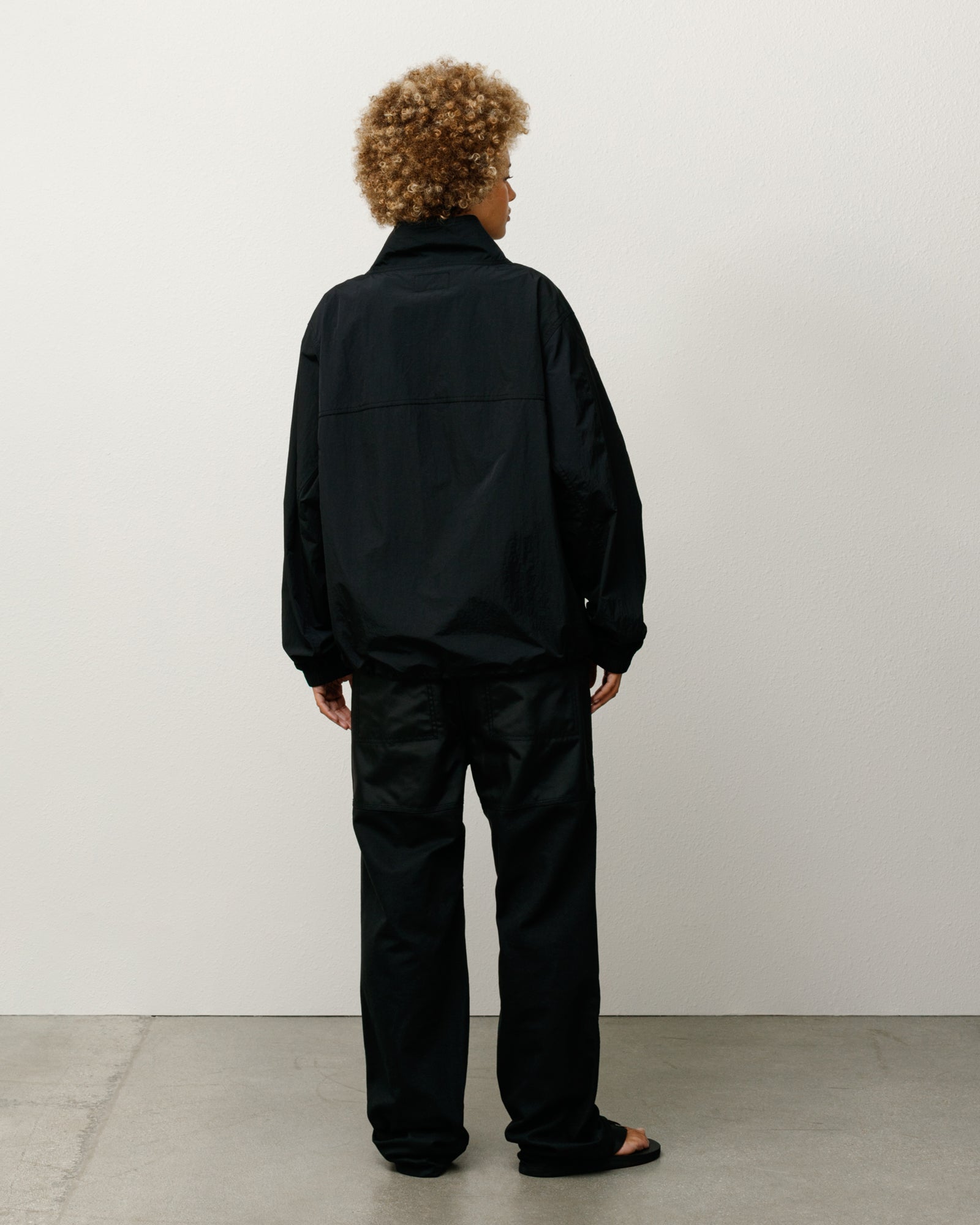 Warm Up Pullover – Black | Outerwear | Stüssy Canada