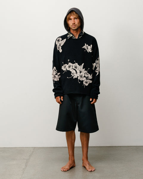 Black roll neck sweater with allover floral knit, relaxed unisex long sleeves