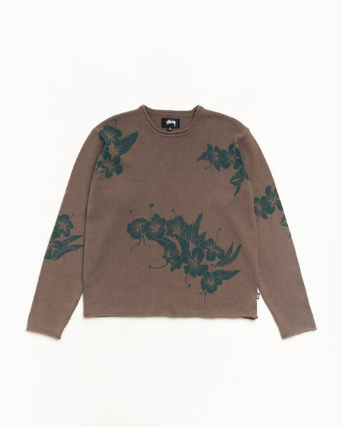 Brown knit crewneck sweater with dark green floral print, long sleeves, flat lay front view.