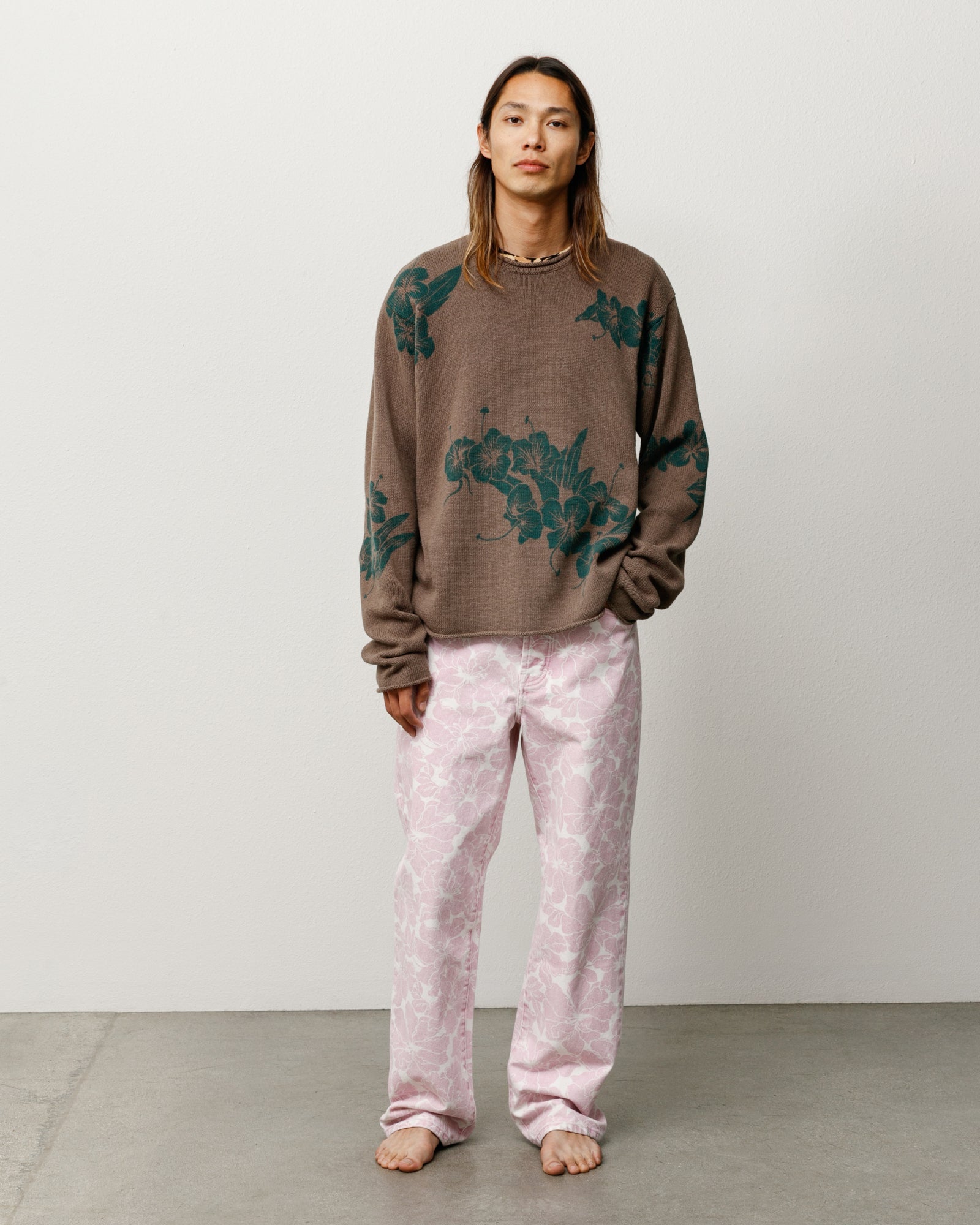 Brown floral roll neck sweater, unisex long-sleeve knit with allover pattern on model