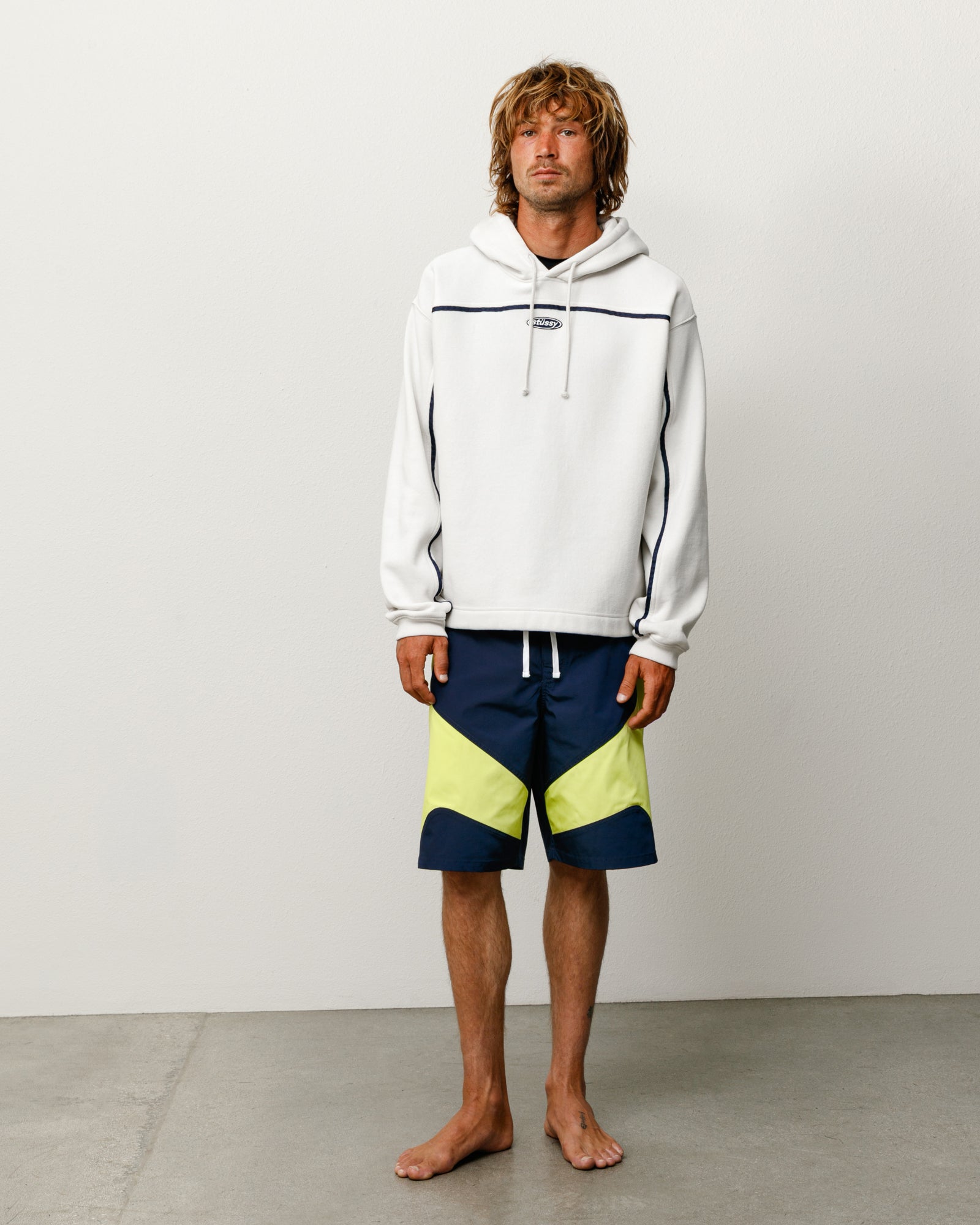 Stone oval pullover hoodie with contrast piping, drawcord hood and ribbed cuffs.