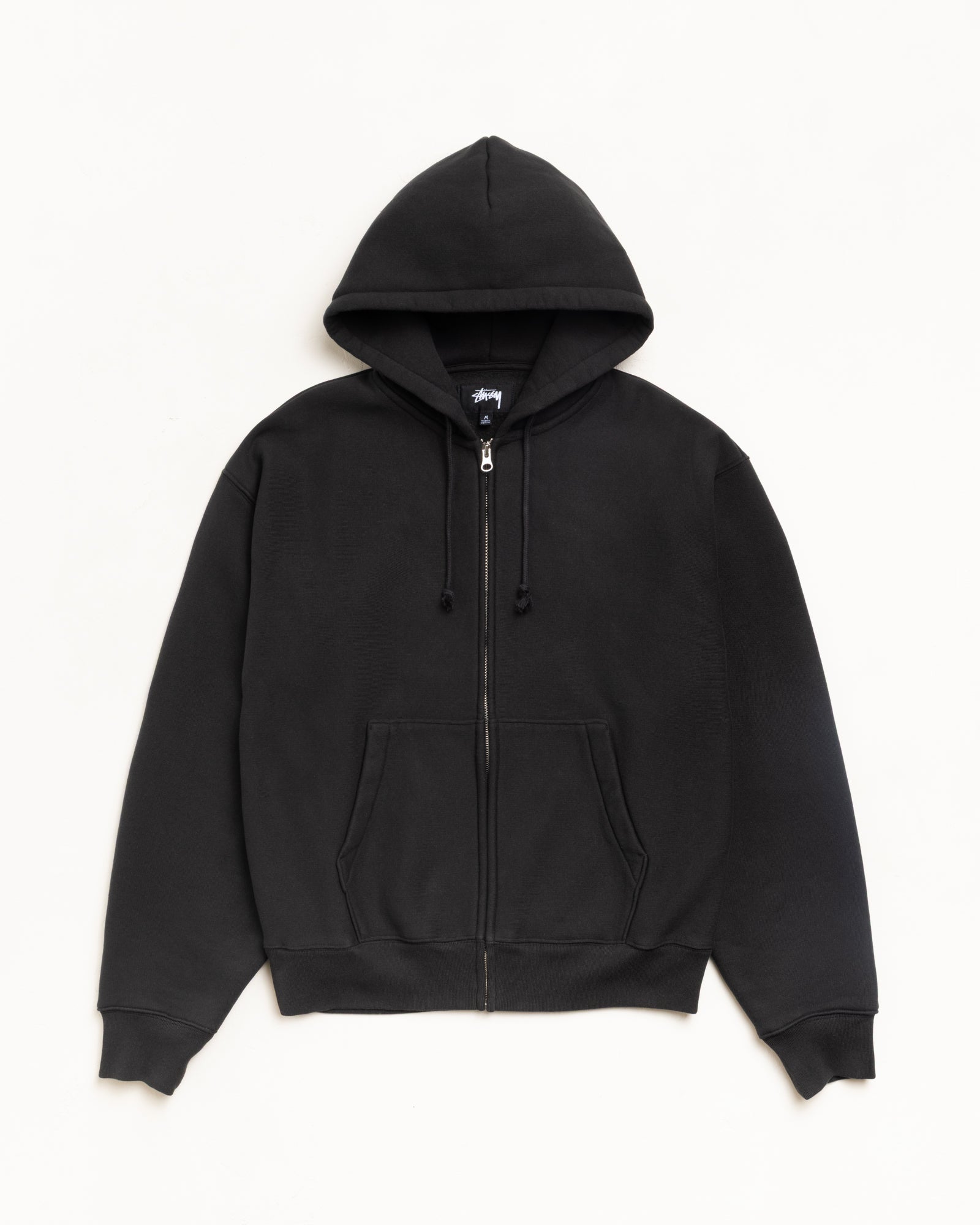 Black zip hoodie with metal zipper, drawcord hood, kangaroo pocket, and ribbed cuffs and hem