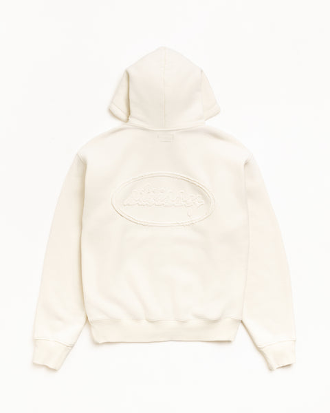 Natural zip hoodie, back view with tonal cursive applique logo