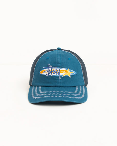 Blue cotton twill cap with Stüssy logo and star embroidery, contrast zigzag stitching