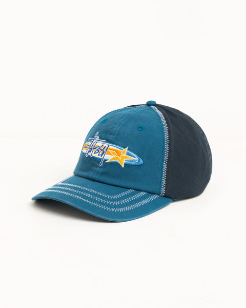 Blue low-profile cap with star logo embroidery and contrast zigzag stitching