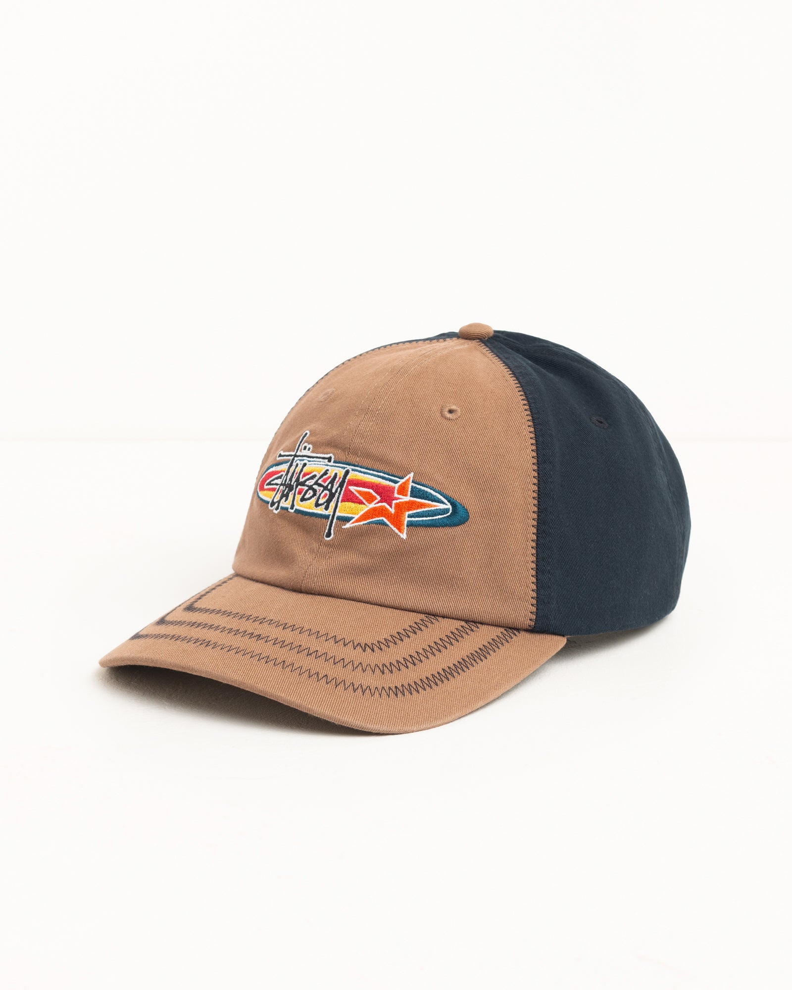 Brown and navy cotton twill cap with oval star embroidery and zig-zag stitched brim