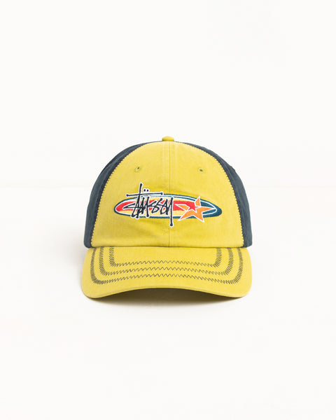 Front view of lime cotton twill cap with oval-star logo embroidery and zig-zag stitched brim