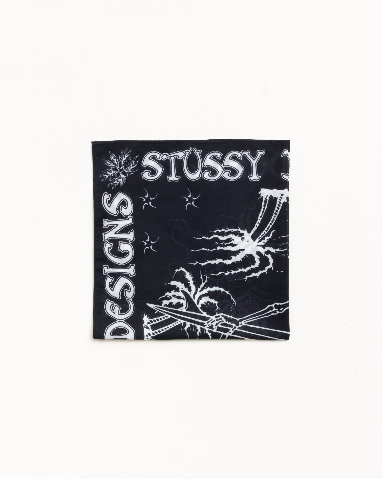 Black cotton bandana with white graphic print, bold logo text, and contrast border