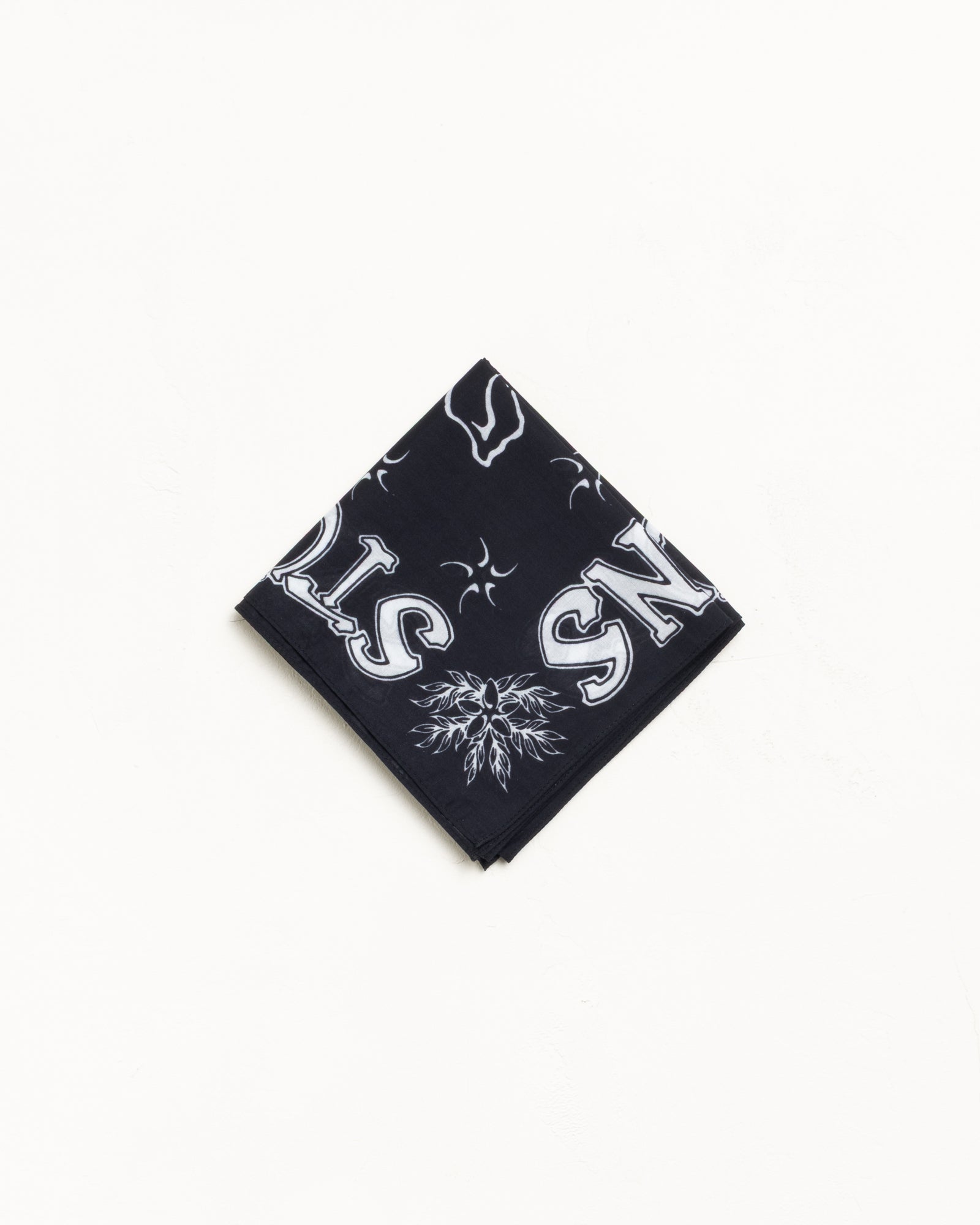 Black cotton bandana with white graphic print, folded square on a clean background
