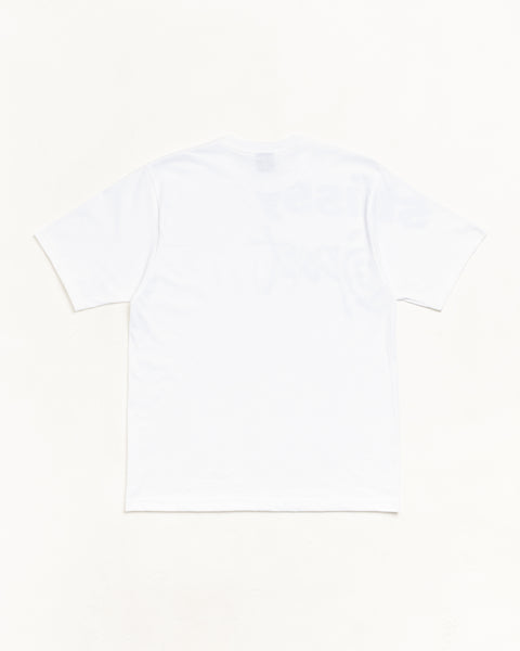 Stüssy white short-sleeve tee, back view on flat lay, minimal design