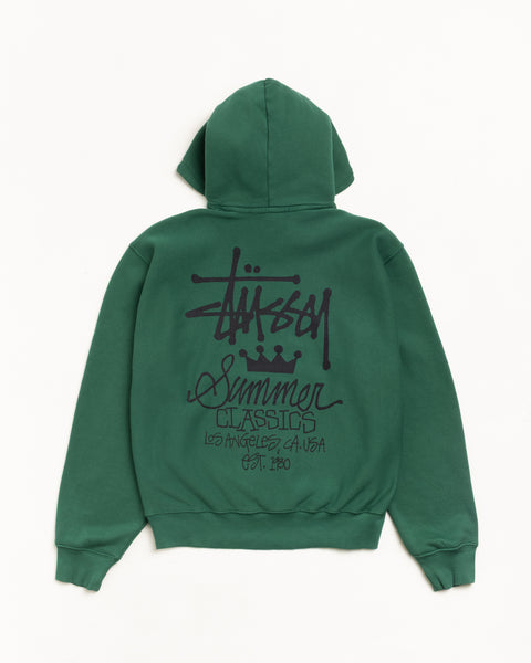 Pine green fleece hoodie with oversized black back logo print; ribbed cuffs